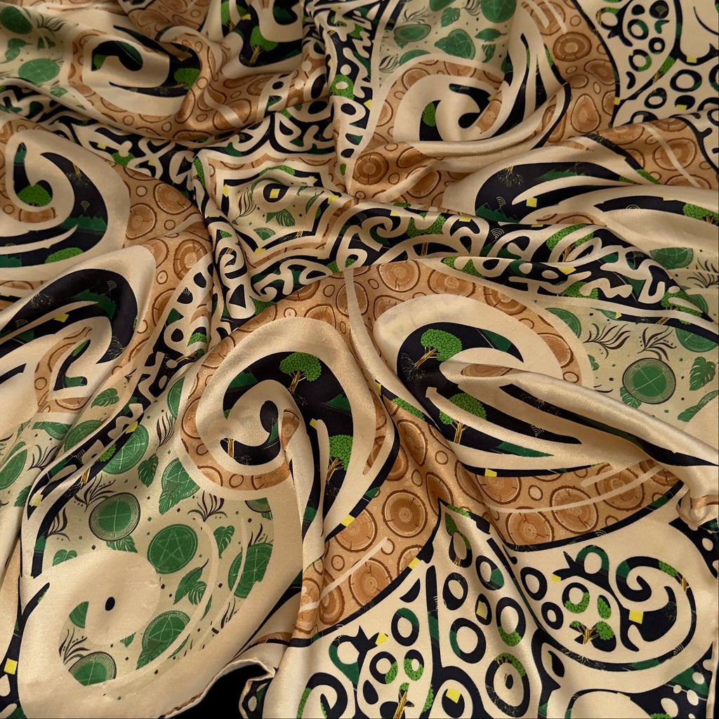 Silk scarf with black, beige, green earth element patterns with spiritual meanings